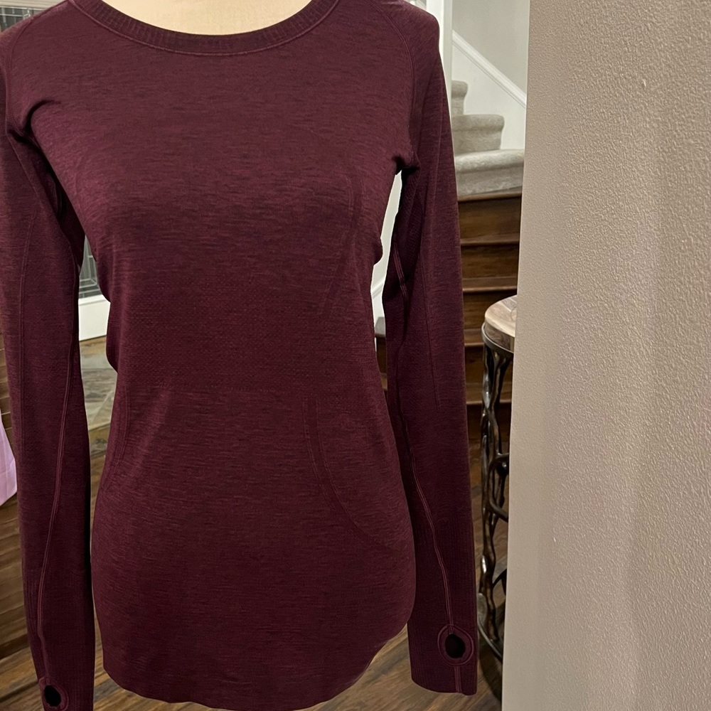 SOLD - Lululemon women’s long sleeve shirt, size 8.